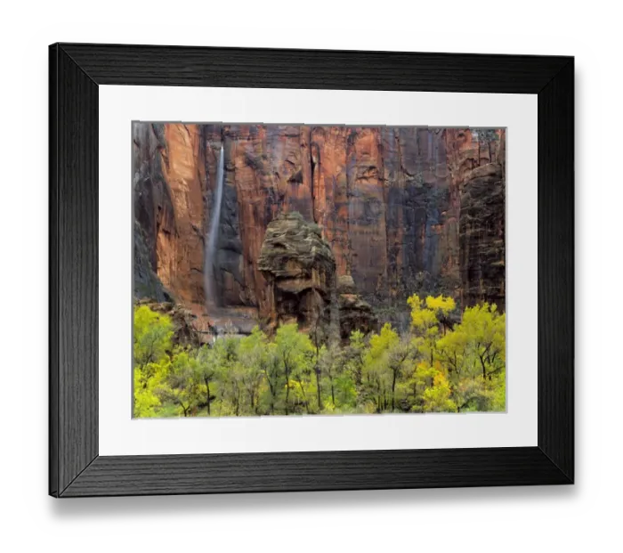 Framed Print : Zion National Park, Utah. USA. Ephemeral waterfall pours over cliff above rock formation Framed Print : Zion National Park, Utah. USA. Ephemeral waterfall pours over cliff above rock formation