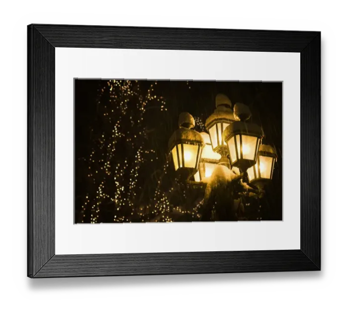 Framed Print : USA, Washington, Leavenworth. Snow-covered street lamps at night during Christmas holiday Framed Print : USA, Washington, Leavenworth. Snow-covered street lamps at night during Christmas holiday