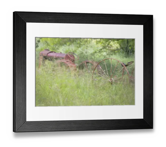 Framed Print : USA, Washington, Seabeck. Rusty old tractor in grasses waving in breeze. Credit as