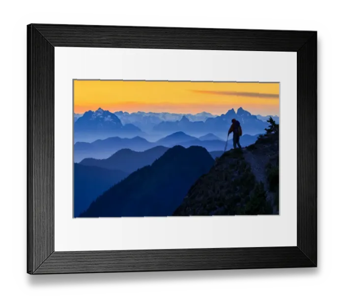 Framed Print : USA. Washington State. A backpacker decends from the Skyline Divide in the North Cascades near Mt Framed Print : USA. Washington State. A backpacker decends from the Skyline Divide in the North Cascades near Mt