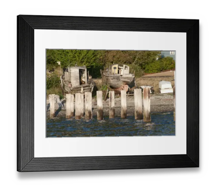 Framed Print : USA, WA, Puget Sound. Absent pier and derelict boats on Port Orchard Narrows