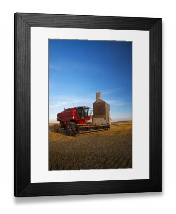 Framed Print : North America; Washington; Palouse Country; Combine Parked by Silo