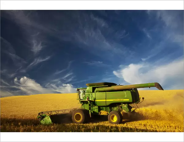 North America; Washington; Palouse Country; Combine Harvesting Wheat