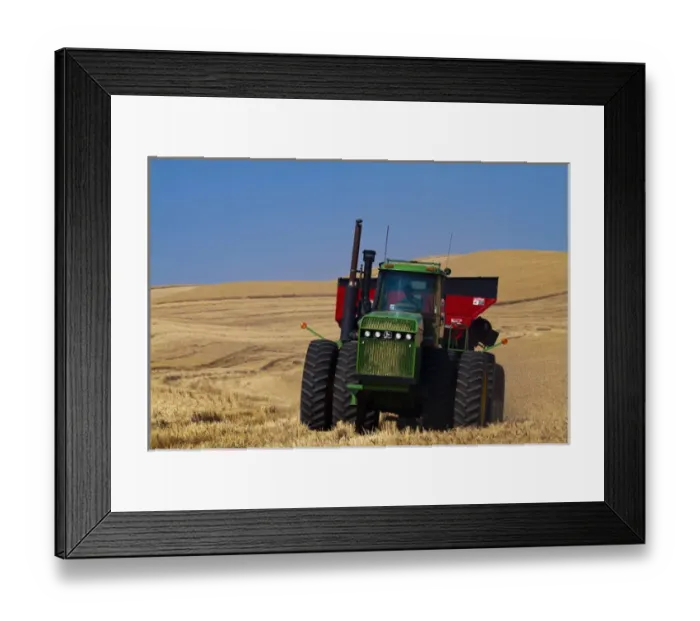 Framed Print : North America; Washington; Palouse Country; Wheeled Field Tractor bringing in Wheat
