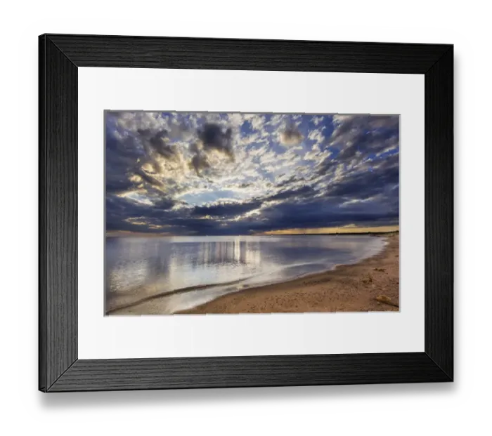 Framed Print : Sun breaks trough cloudy morning at Superior Point on Lake Superior near Superior