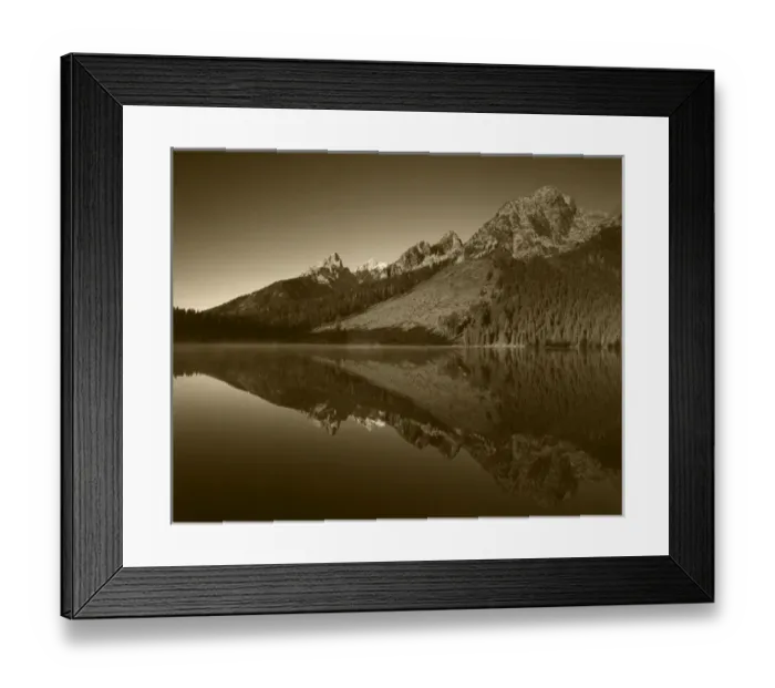 Framed Print : USA, Wyoming, Grande Teton National Park, Cathedral group mountain reflecting in