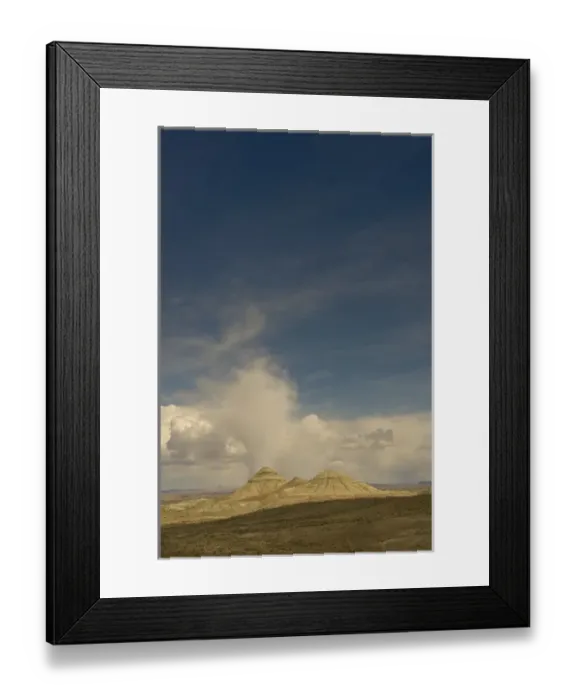 Framed Print : Sandstone Buttes (Badlands) Uinta County near Interstate 80, Wyoming. Low hanging Cumulus Clouds Framed Print : Sandstone Buttes (Badlands) Uinta County near Interstate 80, Wyoming. Low hanging Cumulus Clouds