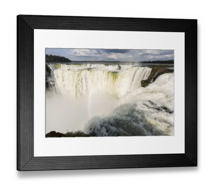 Framed Print : The headwater of Iguazu Falls with a rainbow from the Argentinian side with Brazil in the background Framed Print : The headwater of Iguazu Falls with a rainbow from the Argentinian side with Brazil in the background