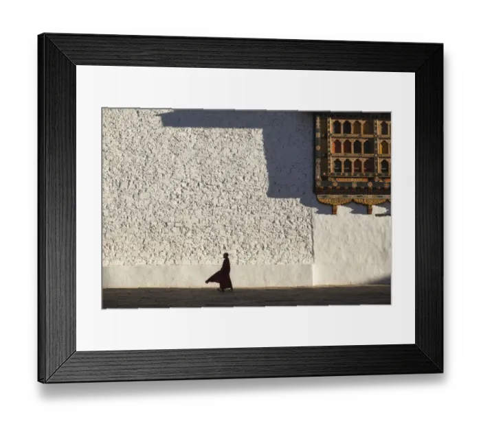 Framed Print : Monk walks through the courtyard of Rinpung Dzong (Monastery) also called Paro Dzong Framed Print : Monk walks through the courtyard of Rinpung Dzong (Monastery) also called Paro Dzong