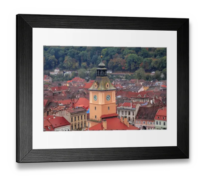 Framed Print : Brasov, Romania. Rooftops and city from hilltop. Clock tower Framed Print : Brasov, Romania. Rooftops and city from hilltop. Clock tower