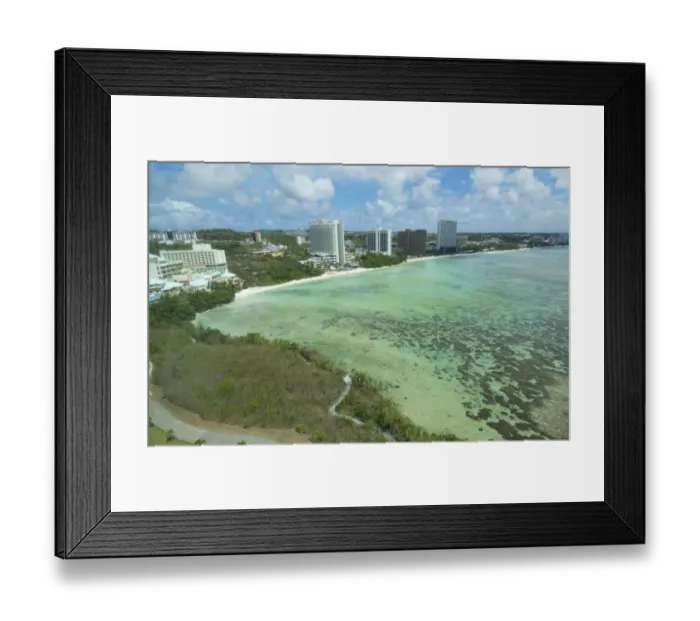 Framed Print : Guam USA Territory Tumon Bay hotels and beach from above with ocean beach and clouds Framed Print : Guam USA Territory Tumon Bay hotels and beach from above with ocean beach and clouds