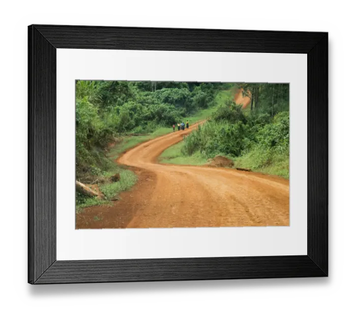 Framed Print : Local people traveling on dirt road, west Uganda