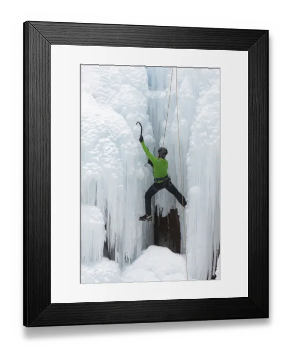 Framed Print : USA, Colorado, Uncompahgre National Forest. Climber ascends ice-encrusted cliff face