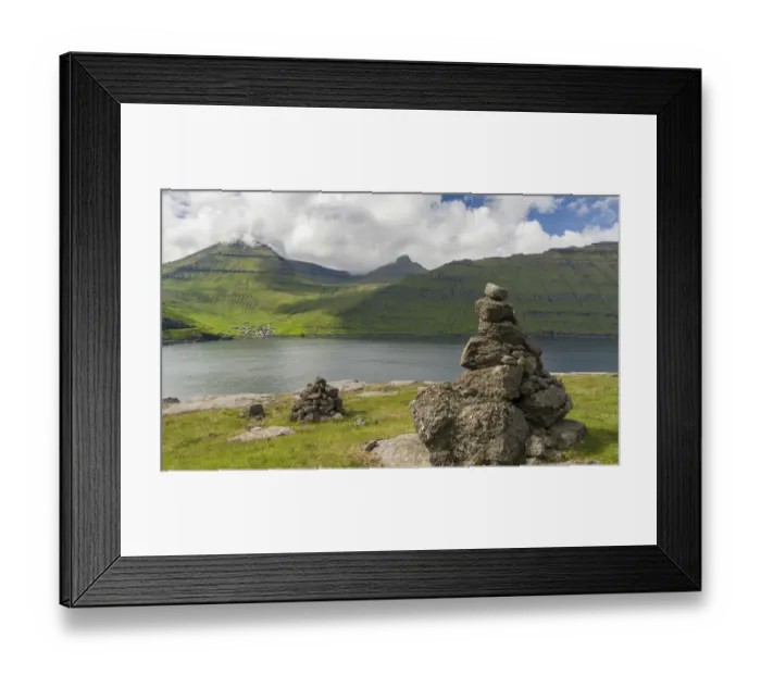 Framed Print : Old traditional cairns, in the background mount Slaettaratindur, the highest peak in the Faroe