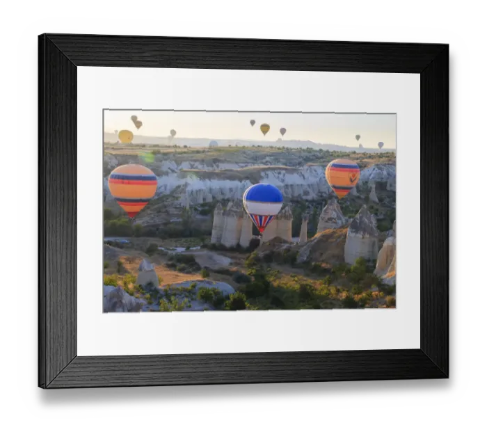 Framed Print : Turkey, Anatolia, Cappadocia, Goreme. Hot air balloons flying above / among rock formations Framed Print : Turkey, Anatolia, Cappadocia, Goreme. Hot air balloons flying above / among rock formations