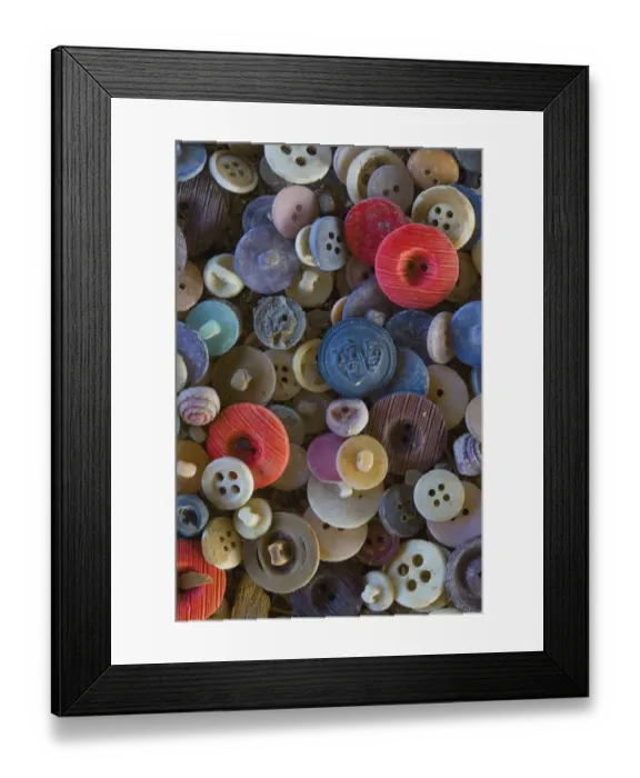 Framed Print : A pile of button that would have been used on sweaters produced in the Roosevelt Framed Print : A pile of button that would have been used on sweaters produced in the Roosevelt