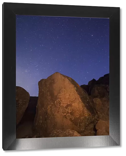 USA, California, Owens Valley. Native American petroglyphs at night