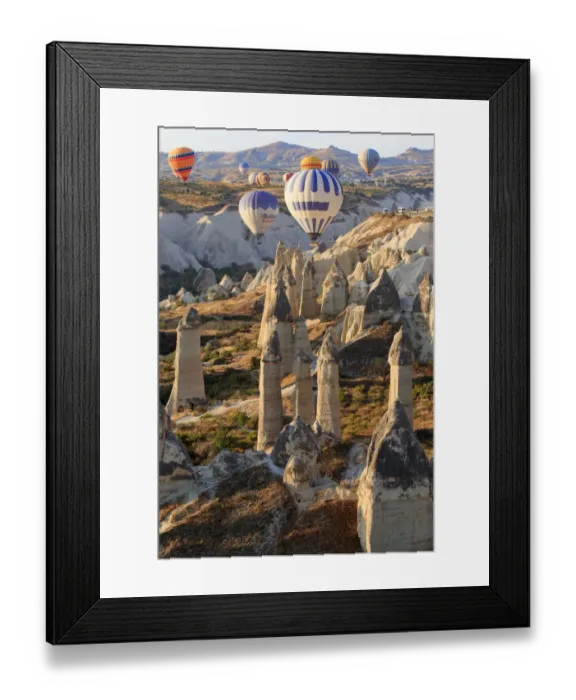 Framed Print : Turkey, Anatolia, Cappadocia, Goreme. Hot air balloons flying above / among rock formations Framed Print : Turkey, Anatolia, Cappadocia, Goreme. Hot air balloons flying above / among rock formations