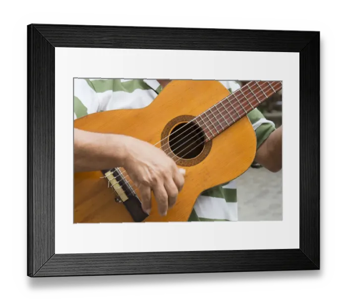 Framed Print : Cuba, Havana. Close-in of man playing guitar