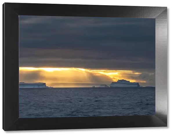 Sunset over icebergs, Antarctica