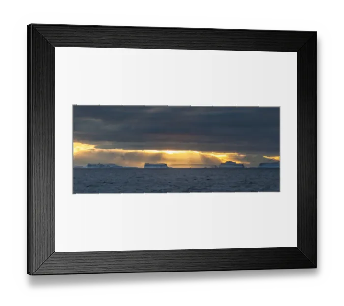 Framed Print : Sunset over icebergs, Antarctica Framed Print : Sunset over icebergs, Antarctica