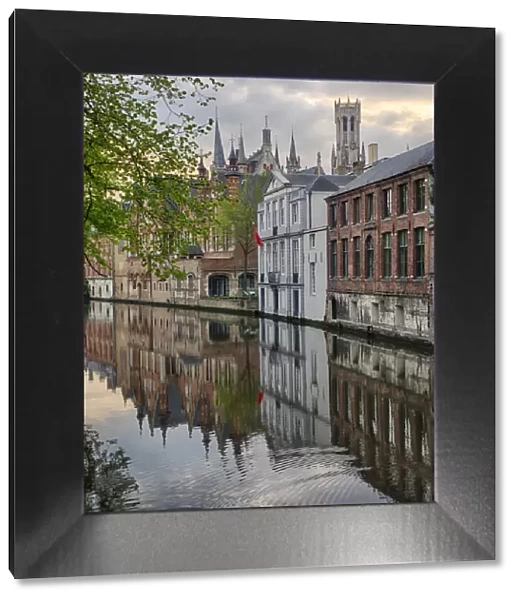 Europe; Belgium; Brugge; West Flanders; Canal Scene with homes and Bridge