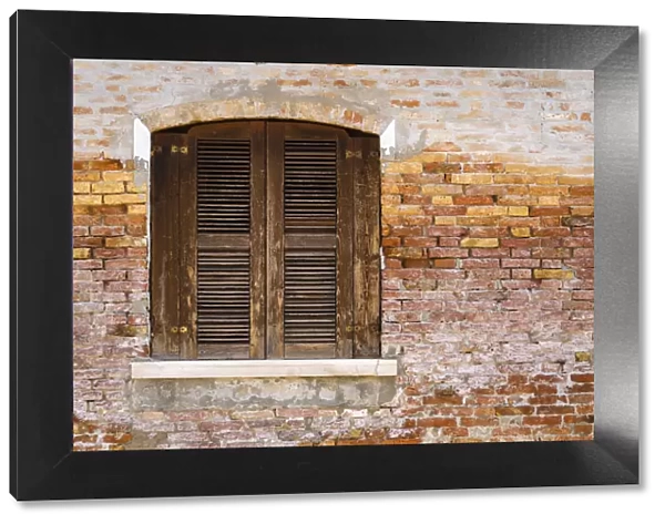 Wooden shutters and brick wall, Burano, Veneto, Italy