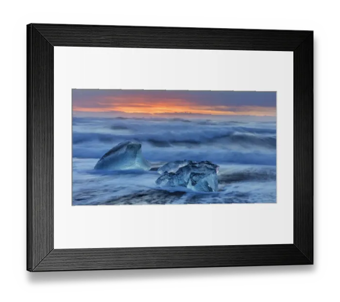 Framed Print : Diamond ice chards from calving icebergs on black sand beach at Jokulsarlon in south Framed Print : Diamond ice chards from calving icebergs on black sand beach at Jokulsarlon in south