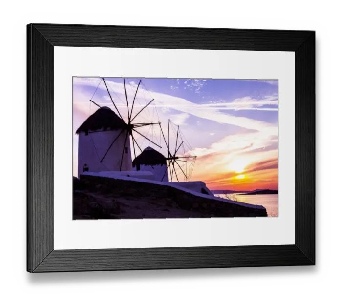 Framed Print : Mykonos, Greece. Two Windmills with a golden, pink, and blue sunset on the Aegean Sea