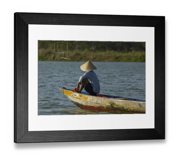 Framed Print : Man fishing from boat on Thu Bon River, Hoi An (UNESCO World Heritage Site), Vietnam Framed Print : Man fishing from boat on Thu Bon River, Hoi An (UNESCO World Heritage Site), Vietnam