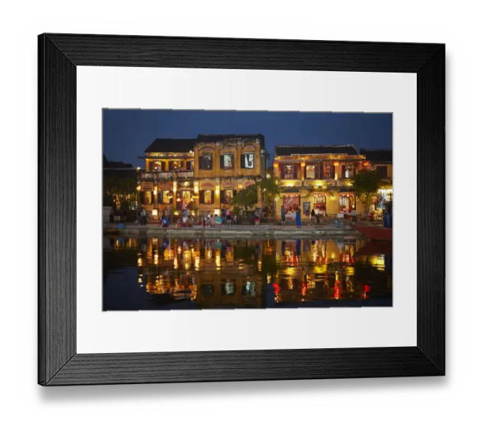 Framed Print : Restaurants and tourists reflected in Thu Bon River at dusk, Hoi An (UNESCO World Heritage Site)