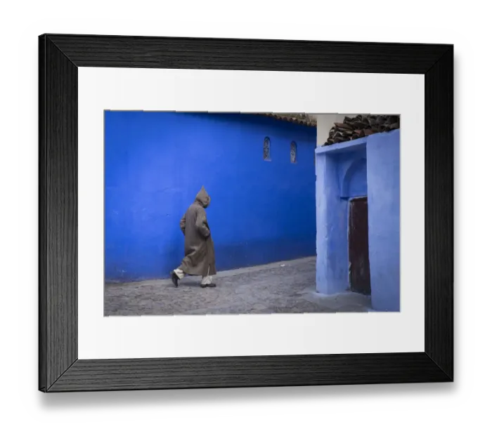 Framed Print : Africa, Morocco. A man walks through an alley in the blue-washed city of Chefchaouen