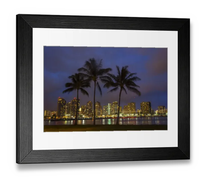 Framed Print : USA; Hawaii; Honolulu; Palm Trees with the night lights of Honolulu