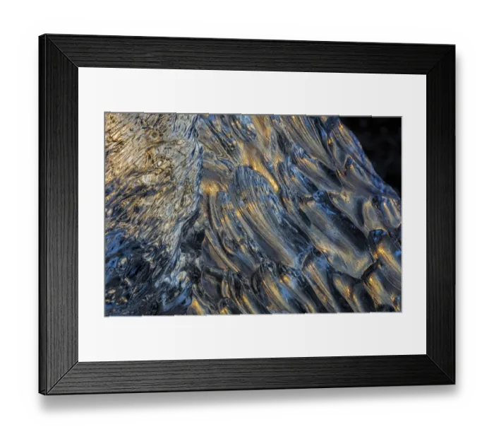 Framed Print : Diamond ice chards from calving icebergs on black sand beach at Jokulsarlon in south Framed Print : Diamond ice chards from calving icebergs on black sand beach at Jokulsarlon in south
