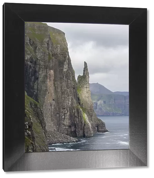The landmark Trollkonufingur in the cliffs of the island of Vagar, part of the Faroe Islands