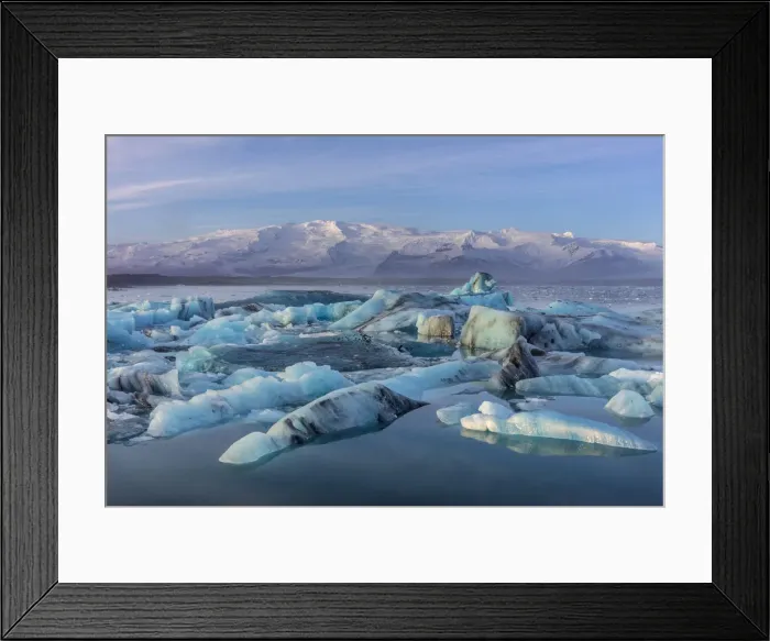 Framed Print : Calving icebergs in Jokulsarlon Glacier Lagoon in south Icleand