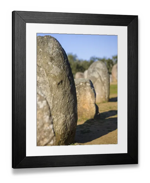 Framed Print : Almendres Cromlech (Cromeleque dos Almendres), an oval stone circle dating back to Framed Print : Almendres Cromlech (Cromeleque dos Almendres), an oval stone circle dating back to