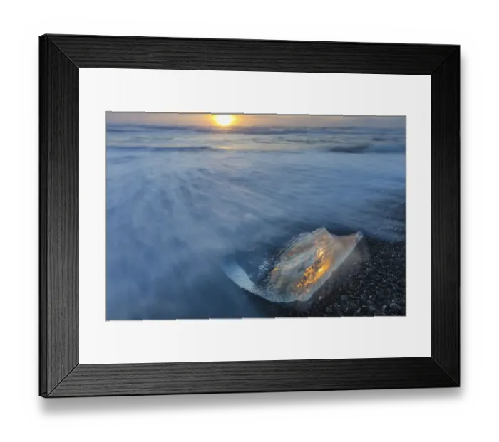 Framed Print : Diamond ice chards from calving icebergs on black sand beach at Jokulsarlon in south Framed Print : Diamond ice chards from calving icebergs on black sand beach at Jokulsarlon in south