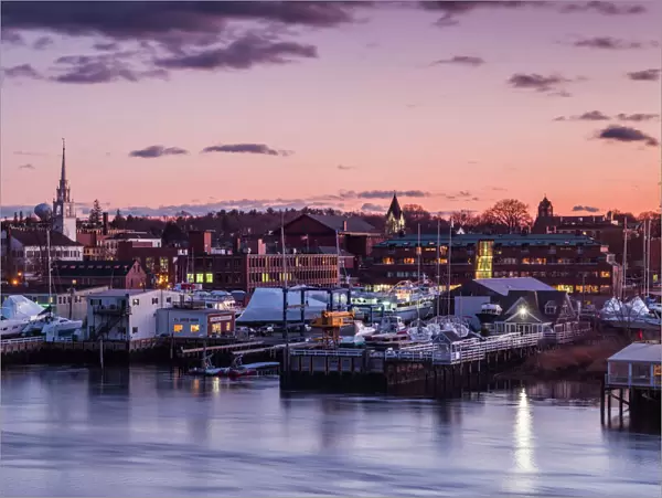 USA, Massachusetts, Newburyport, skyline from the Merrimack River at dusk