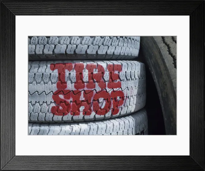 Framed Print : USA, Nevada, Beatty, Tire shop sign painted on old tires