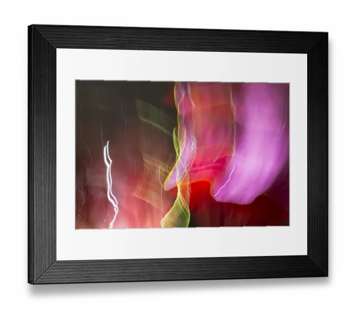Framed Print : Colorful glass with blurred motion effect