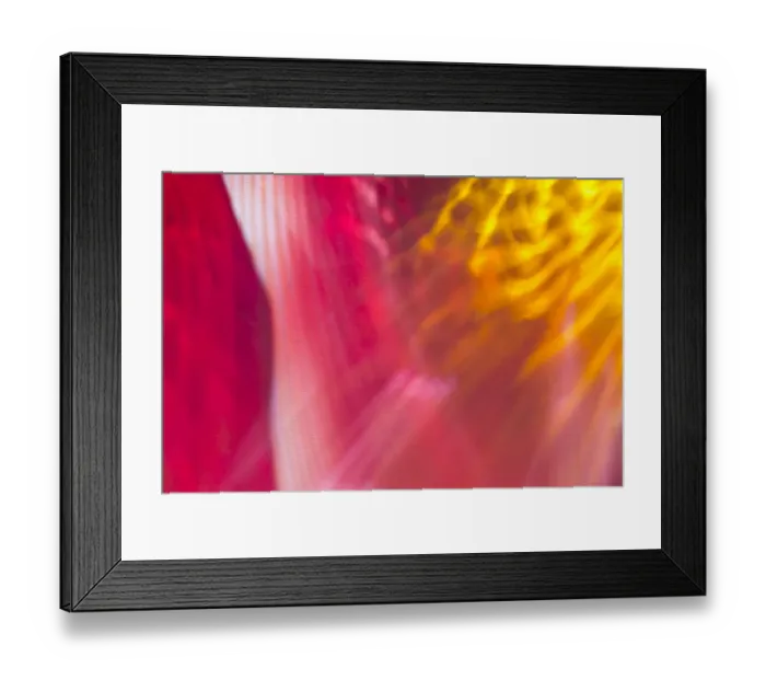 Framed Print : Colorful glass with blurred motion effect