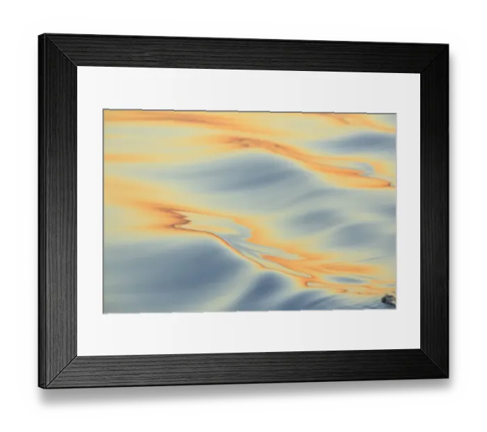 Framed Print : Sunset colors and patterns on small waves in water Framed Print : Sunset colors and patterns on small waves in water