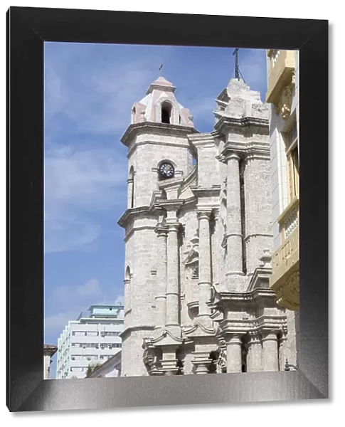 Cuba, Havana, Old Havana. Clock tower of church in Cathedral Plaza