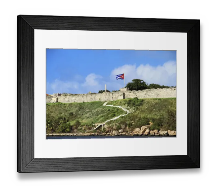 Framed Print : Cuba, Havana. Fortress wall and Cuban flag at San Carlos de la Cabana fortress in Framed Print : Cuba, Havana. Fortress wall and Cuban flag at San Carlos de la Cabana fortress in