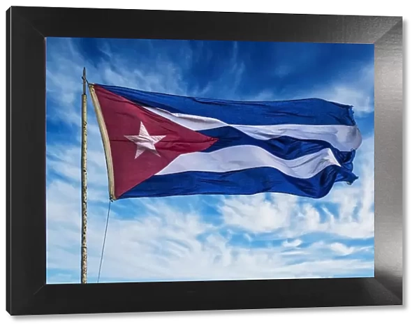 Cuba, Havana Vieja, Cuban flag waving in the breeze