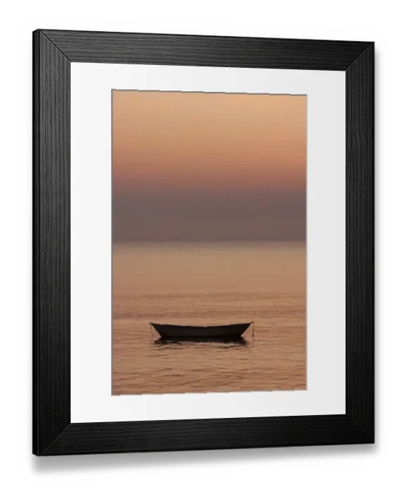 Framed Print : Rowboat at anchor in the water at sunset Framed Print : Rowboat at anchor in the water at sunset