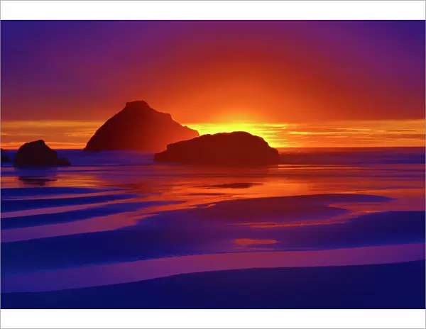 USA, Oregon, Bandon. Beach abstract of Face Rock at sunset