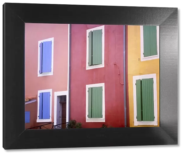 France, Provence, Roussillon. Colorful building exteriors