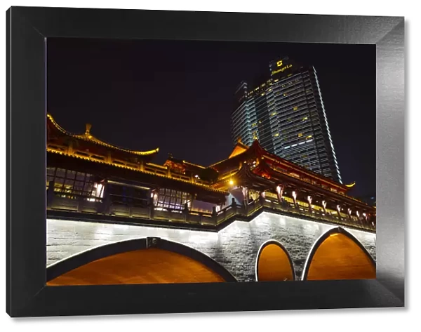Night view of Anshun Bridge with modern high-rise, Chengdu, Sichuan Province, China